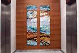 "Commissioned" Dyptic work displayed in a well known commercial office building in Texas; this abstract style combines gentle color transitions, nature tones, and calm components brought together to create feelings of calm comfort and subtle joy. They are a favorite stylistic choice among clients who use her paintings as upscale, installment artwork in large settings.
