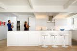 MCM updated white on white kitchen by Cadence Design Studio.  