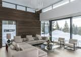 Living Room, Medium Hardwood Floor, Chair, Pendant Lighting, Ceiling Lighting, and Sofa Living room  Photo 7 of 16 in Casa Myhrer Hauge by Gudmundur Jonsson Architect