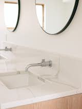 Wall-mounted faucets allow for ease of cleaning