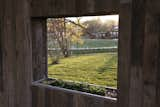 Sitting in the rocking chairs triggers the collected rainwater to drop from the 'cloud' and the tops of the windows onto the edible plants growing in the windowsills