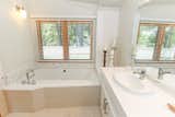 white(out) house: the master bathroom is fitted with eco-friendly WaterSense fixtures.