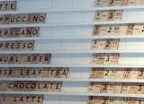 Inspiring, wood, Scrabble-style drink menu at Madison Coffee & Tea Co.