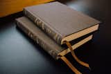 Two New Testament volumes of the new Reader's Bible in rich olive cloth-over-board bindings.