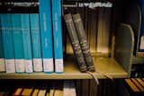 Two Reader's Bible volumes rest at an angle on the shelf at the Mt. Angel Abbey Library.