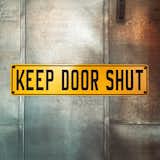The "Keep Door Shut" sign on a galvanized metal door resembles something you would expect to see in a nuclear bunker or on an episode of LOST.  Photo 6 of 10 in Schoolhouse Electric by Jonathan Simcoe