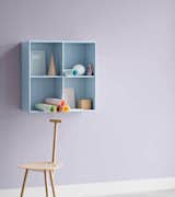 This small wall unit is a way to create impromptu storage at arm's reach.