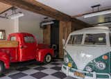 Garage and Storage Room Type Another view of the garage reveals its extensive space to house vehicles and protect them from the elements.  Photo 6 of 8 in A Guest Barn in Jackson, Wyoming, Fuses Modern and Rustic Elements