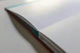 The pages of the MOO notebook are subtly lined using Munken Design Kristall paper (100gsm/70 lb text). It performs exceptionally with thick felt markers, providing minimal bleed-through. https://www.moo.com/us/products/notebooks/moo-hardcover-notebook.html  Search “punctuation-page-markers.html” from The MOO Hardcover Notebook
