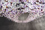 Artikoi crystal chandelier with coloured crystals.