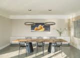 Dining Room, Chair, Accent Lighting, Table, Ceiling Lighting, Concrete Floor, and Storage Dining room  Photo 2 of 25 in Long Island Sound House by Sellars Lathrop Architects