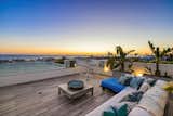 Panoramic ocean views from Malibu all the way to Catalina-  the focal point of this sophisticated rooftop deck that elevates outdoor beach living.