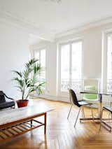 Living Room, Coffee Tables, Chair, Table, and Medium Hardwood Floor Parisian living space. Chemin Vert by Septembre. © David Foessel.

upinteriors.com/go/sph411  Photos from Old-World Charm Meets Modern Finishes in These 6 Parisian Apartments