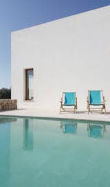 Outdoor, Hardscapes, Swimming, Small, Stone, Tile, Pavers, and Horizontal Mediterranean patio with pool. PI House by Munarq. © Adrià Goula.

upinteriors.com/go/sph419  Outdoor Swimming Tile Hardscapes Photos from Favorites