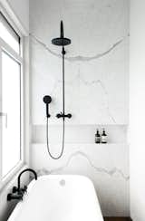 Marble wall with black shower fixtures. JVR Apartment by Dieter Vander Velpen Architects. © Patricia Goijens.

upinteriors.com/go/sph194