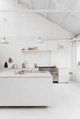White industrial kitchen. Studio 8A by Rye London.

upinteriors.com/go/sph19 