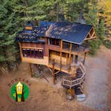 Outdoor, Trees, Woodland, Small Patio, Porch, Deck, Wood Patio, Porch, Deck, and Decking Patio, Porch, Deck Aerial view of the Montana Treehouse Retreat   Photo 3 of 7 in The Montana Treehouse Retreat by Kati O'Toole