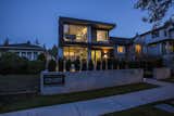 Exterior, Metal Siding Material, House Building Type, Metal Roof Material, Wood Siding Material, and Flat RoofLine Walking by the front of the Main House during twilight doing a double-take.  Kolbe Windows & Doors’s Saves from The C-House