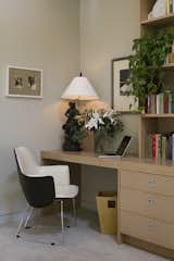 Bedrooms in dual master suites serve multiple functions including an office.