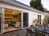 The entire great room opens up to the outdoor space.