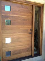 This is our Eame pivot door with glass sidelight. All of our standard door models come with 10 options for customization and instant pricing! Check them out at http://www.pivotdoorcompany.com/Exterior-Doors/.