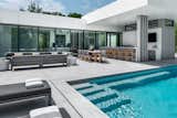 Outdoor, Back Yard, Landscape Lighting, Large Patio, Porch, Deck, Hardscapes, and Large Pools, Tubs, Shower Epic, expansive, pool views.  Photo 5 of 12 in Miami Modern by smpl Design Studio