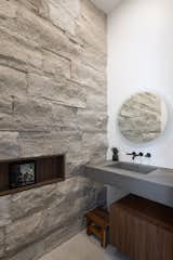 natural stone in the main floor powder room