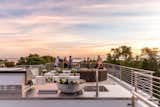 Outdoor, Rooftop, Large Patio, Porch, Deck, Stone Patio, Porch, Deck, and Tile Patio, Porch, Deck Sunset on the roof deck.   Photo 5 of 17 in Xanadu by Spaces CT