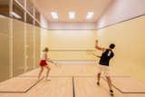 Regulation squash court by Anderson. Doubles a half basketball court. 