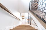 Staircase with custom made steel wall