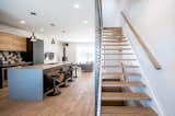 Open concept and good view of the staircase with custom made steel walls