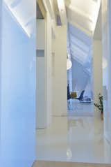 Hallway A view thru 1st floor of the attic/apartment.  Photo 8 of 27 in Rhapsody in White  / Attic by AT26  architects