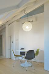 Dining Room, Chair, Table, Medium Hardwood Floor, Pendant Lighting, and Accent Lighting Dinning place.  Photo 4 of 27 in Rhapsody in White  / Attic by AT26  architects