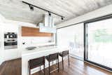 Kitchen atmosphere.  Photo 11 of 17 in White Cubes House by AT26  architects