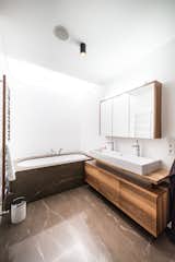 Master bathroom with lightning ceiling.  Photo 9 of 17 in White Cubes House by AT26  architects