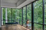 Tonic's clients wanted to maintain a direct visual connection with their beautiful wooded site. The abundant glazing fulfills that wish.