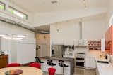 The high ceiling accommodates a row of clerestory windows at the front of the house. 
