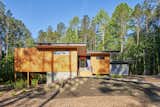 The "veiled" front elevation.  Photo 11 of 11 in The Privacy House by Arielle Condoret Schechter, AIA: Simple, Modern, Net Zero by Kim Weiss