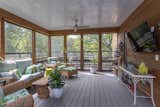 The screened porch at the main living level.