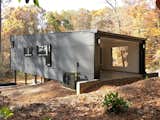 The house's climb up the natural topography concludes with a "back porch."