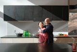 Partners in life and work, Youn and Doug enjoy their new kitchen.
