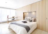 Bedroom, Bed, Ceiling Lighting, Wall Lighting, Recessed Lighting, Light Hardwood Floor, and Chair Daughter's Bedroom  Photo 5 of 14 in Apartment of Perfect Brightness by asap/ adam sokol architecture practice