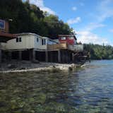 Cabins can some times be found in clusters like these on Puget Sound to take advantage of shared utilities like wells and septic systems.