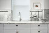 Kitchen, Marble Counter, White Cabinet, Stone Slab Backsplashe, Accent Lighting, and Undermount Sink  Photo 4 of 14 in all_spaces by wayne mayne from Victoria Village House & Garden