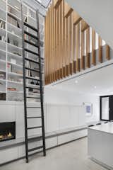 Custom steel library ladder @ atrium bookcase.