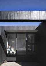 Exterior, House Building Type, Beach House Building Type, Wood Siding Material, Cabin Building Type, Flat RoofLine, and Tile Roof Material  Photo 8 of 19 in House in Puertecillo by Estudio Base Arquitectos