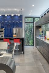 The kitchen showing custom cabinetries and cork flooring