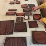 Individually staining and picking the best grain patterns for the discs on our constellation door. 