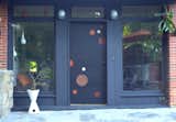 Our constellation door used on a exterior patio entrance.  The wood discs in the designs can compliment the colors of brick or wood on a house's exterior. 