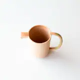 The style of these pastel ceramic pitchers is minimalist and mineral, geological and geometric. With an eye for detail and color that add a perfect dose of poetry. Every piece is hand made by the artist in her Montreal studio. 